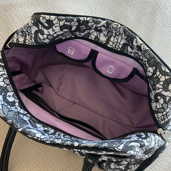 LULULEMON GYM BAG- LIMITED EDITION in black and white floral lace design 15”x9” - Picture 4 of 5